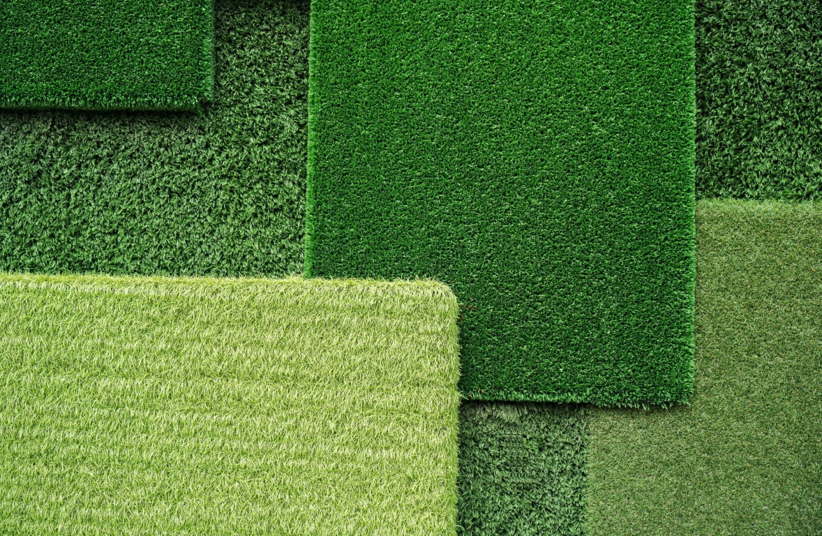 Eco-friendly artificial grass samples showing various turf types in Auburn, AL